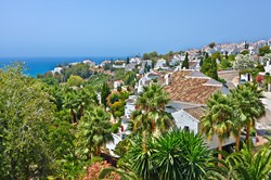 A view to Nerja with the Mediterranean Sea in the background