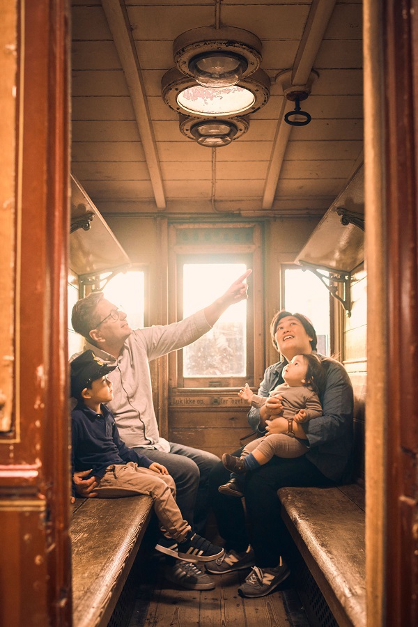 Family in a train compartment