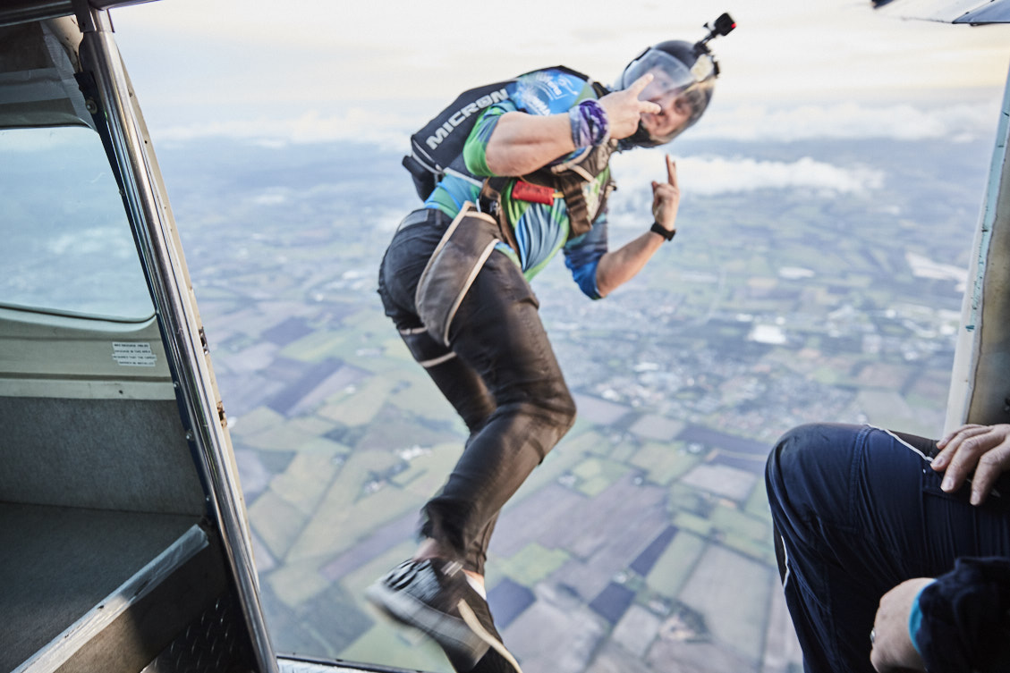 A skydiver jumps out of a plane