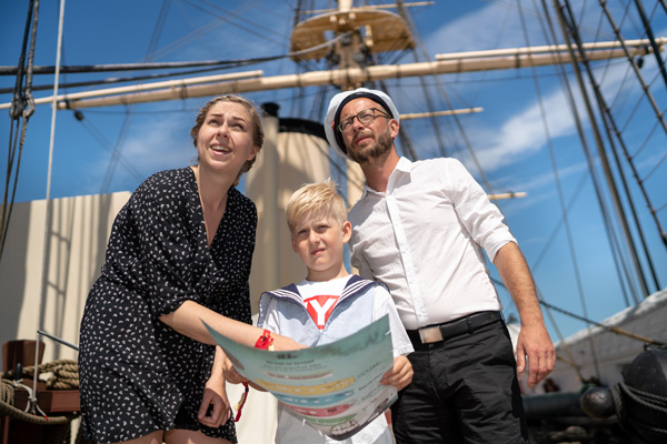 A family aboard the wooden Frigate Jylland in Ebeltoft 
