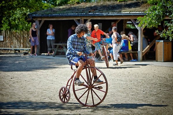 A Boy Riding a Penny-Farthing at Hjerl Hede