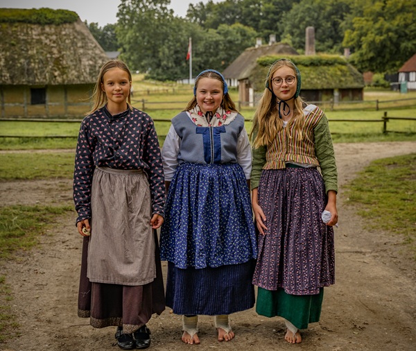 Three Girls in Period Costumes at Hjerl Hede
