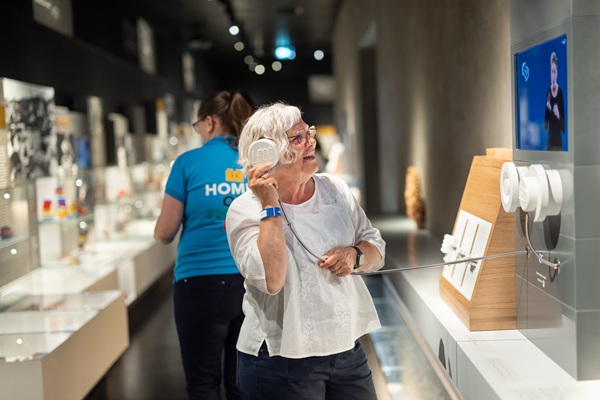 An elderly woman is exploring the official LEGO® museum in the LEGO® House