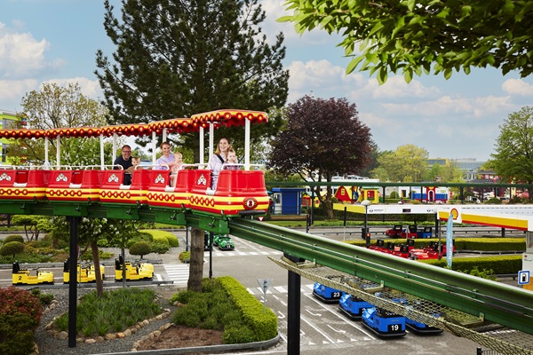 A family on the Monorail train at LEGOLAND® Billund Resort