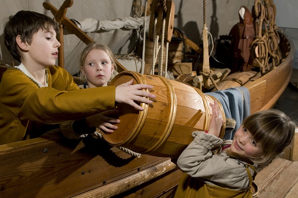 Children helping out at the Viking Ship Museum in Roskilde
