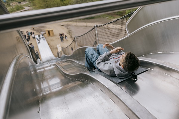Gigantic slide with a teenage boy at WOW PARK